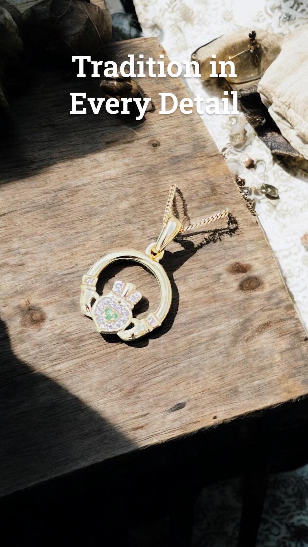 Green and whits stone 14 ct coated on Sterling silver Claggagh pendant on an 18 inch chain .