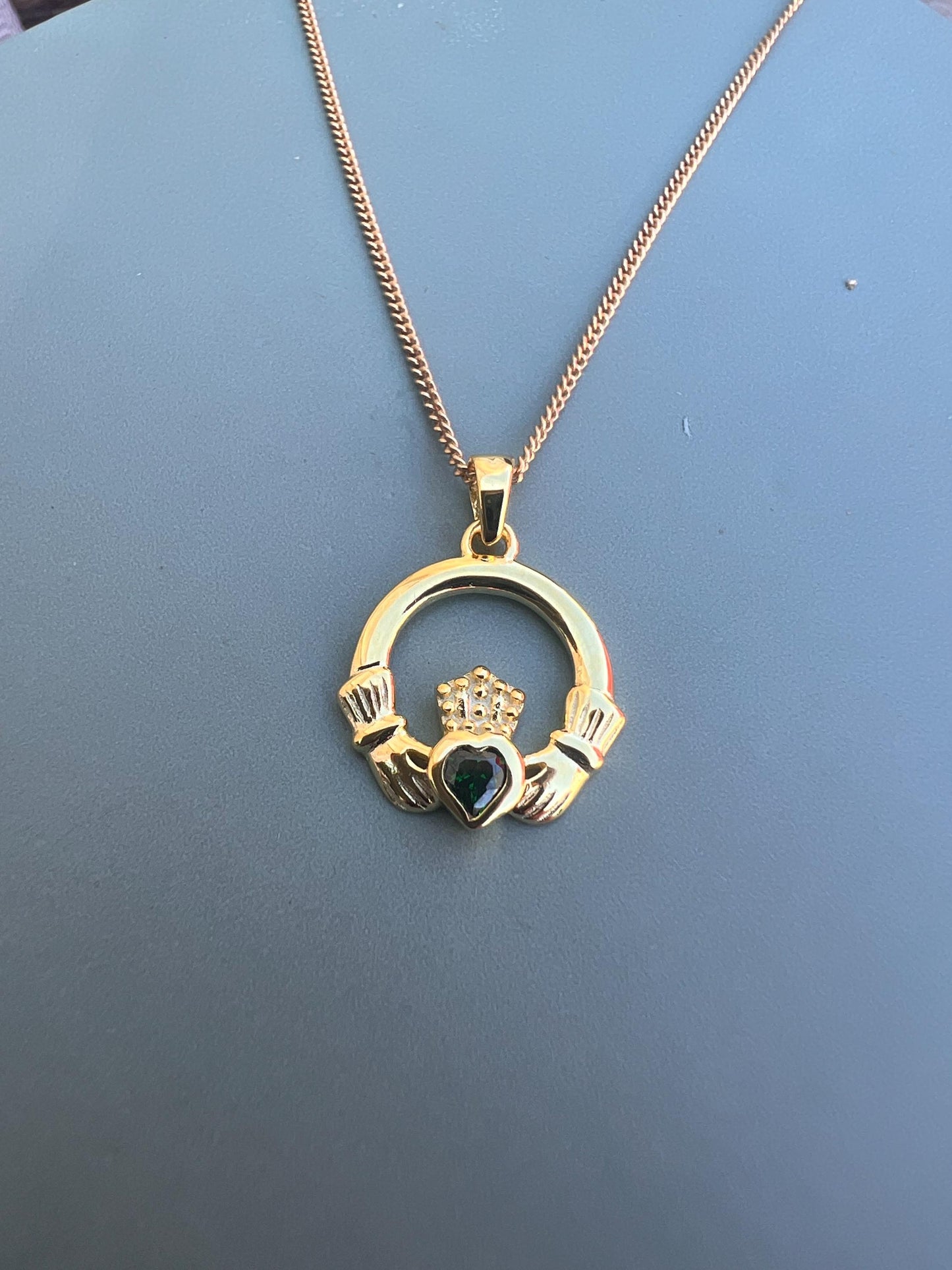 Emerald Green 14 ct gold on Sterling silver Claddagh necklace from Galway .