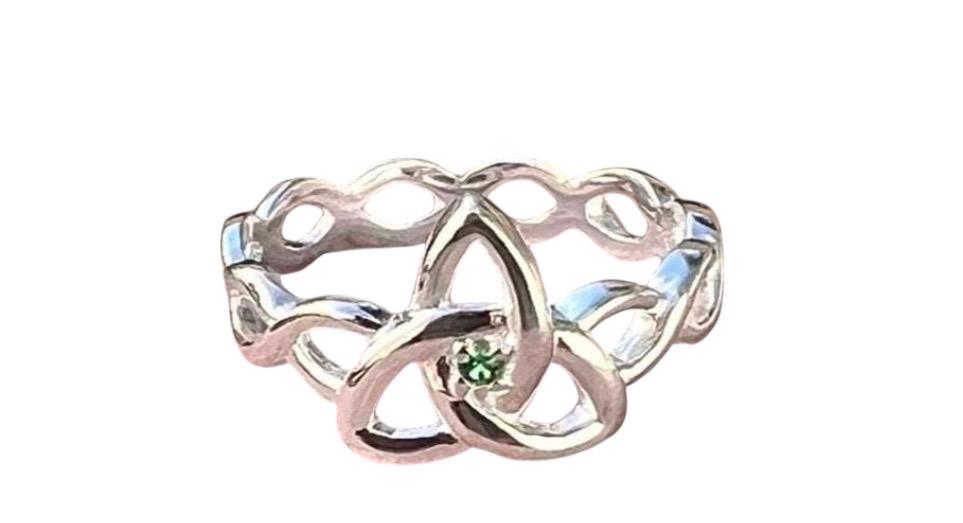 Become part of our Celtic Community with this beautiful Irish trinity know ring with its historical Braided band , an absolute Classic .