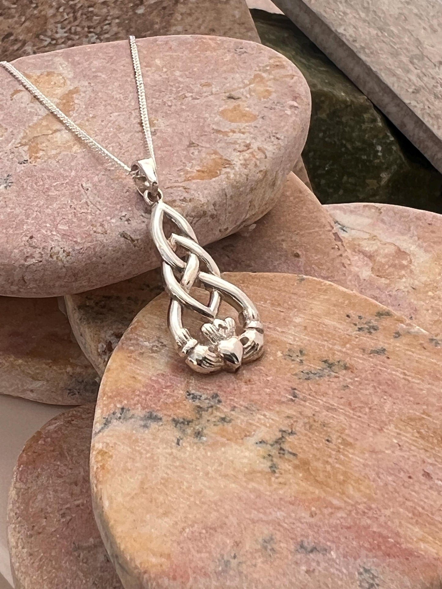 Celtic weave claddagh pendant from Galway .