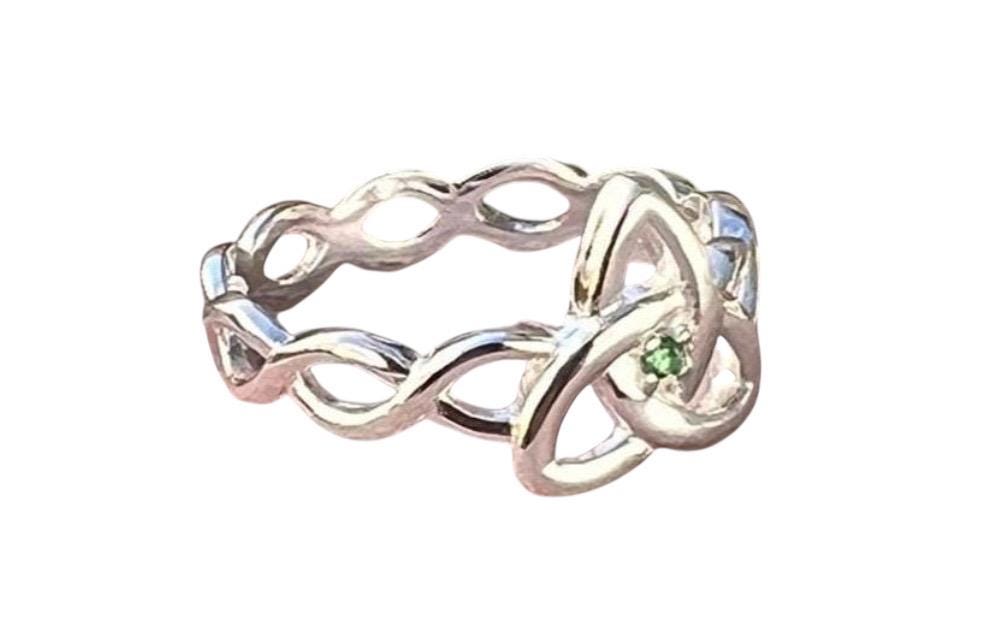 Become part of our Celtic Community with this beautiful Irish trinity know ring with its historical Braided band , an absolute Classic .