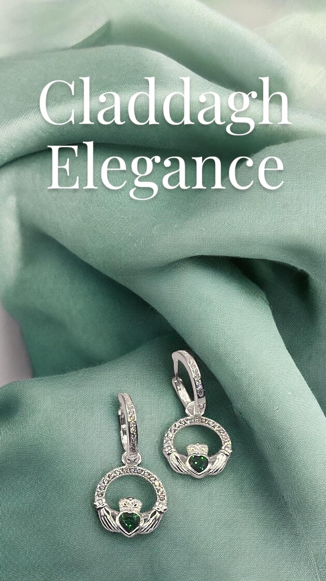 Emerald Green May Birthstone Claddagh earrings on  Huggie hoops ., become part of our z Celtic Community and Celbrate the month of May .