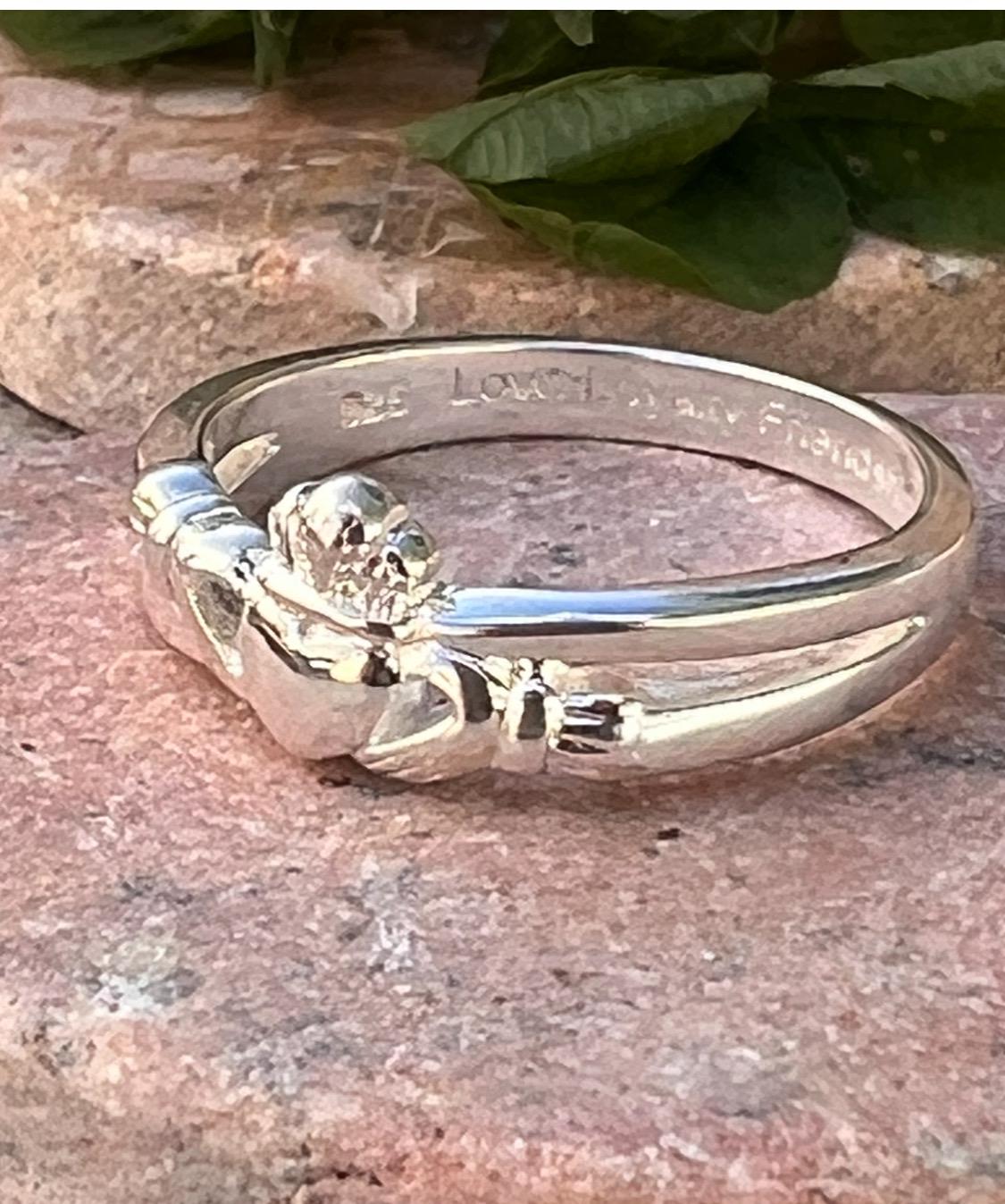 Sterling silver , crossover claddagh ring.
