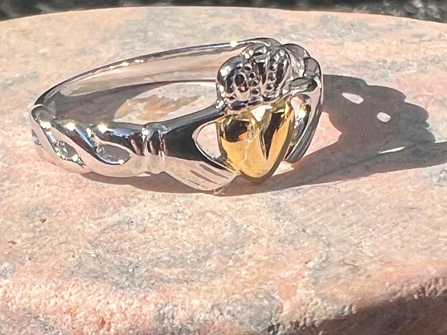 2Tone Claddagh ring with braided band .