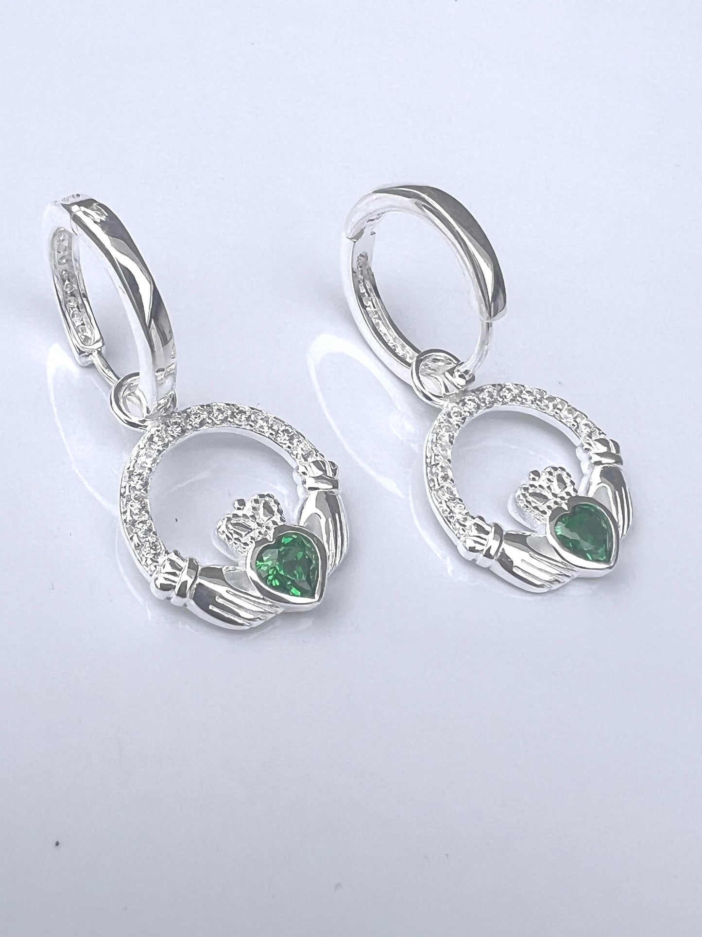 Emerald Green May Birthstone Claddagh earrings on  Huggie hoops ., become part of our z Celtic Community and Celbrate the month of May .