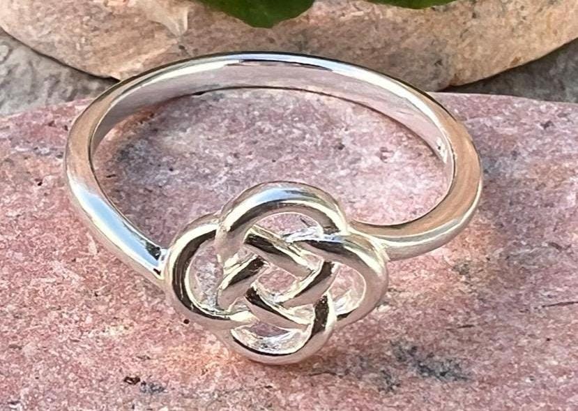 Celtic knot ring from Ireland in Sterling silver .join our Celtic Community , free post worldwide.