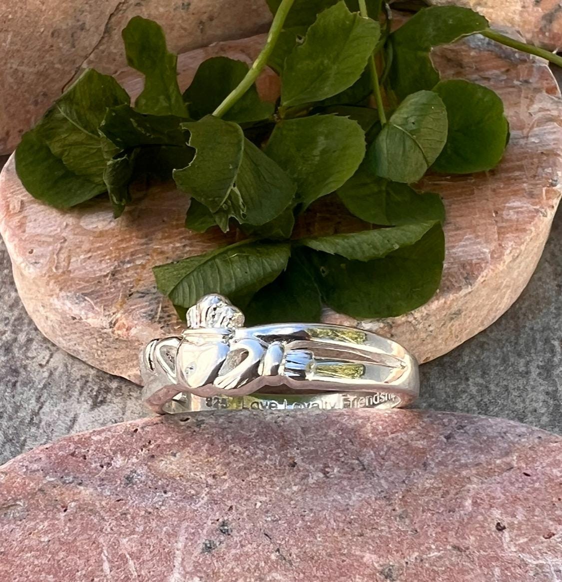 Sterling silver , crossover claddagh ring.