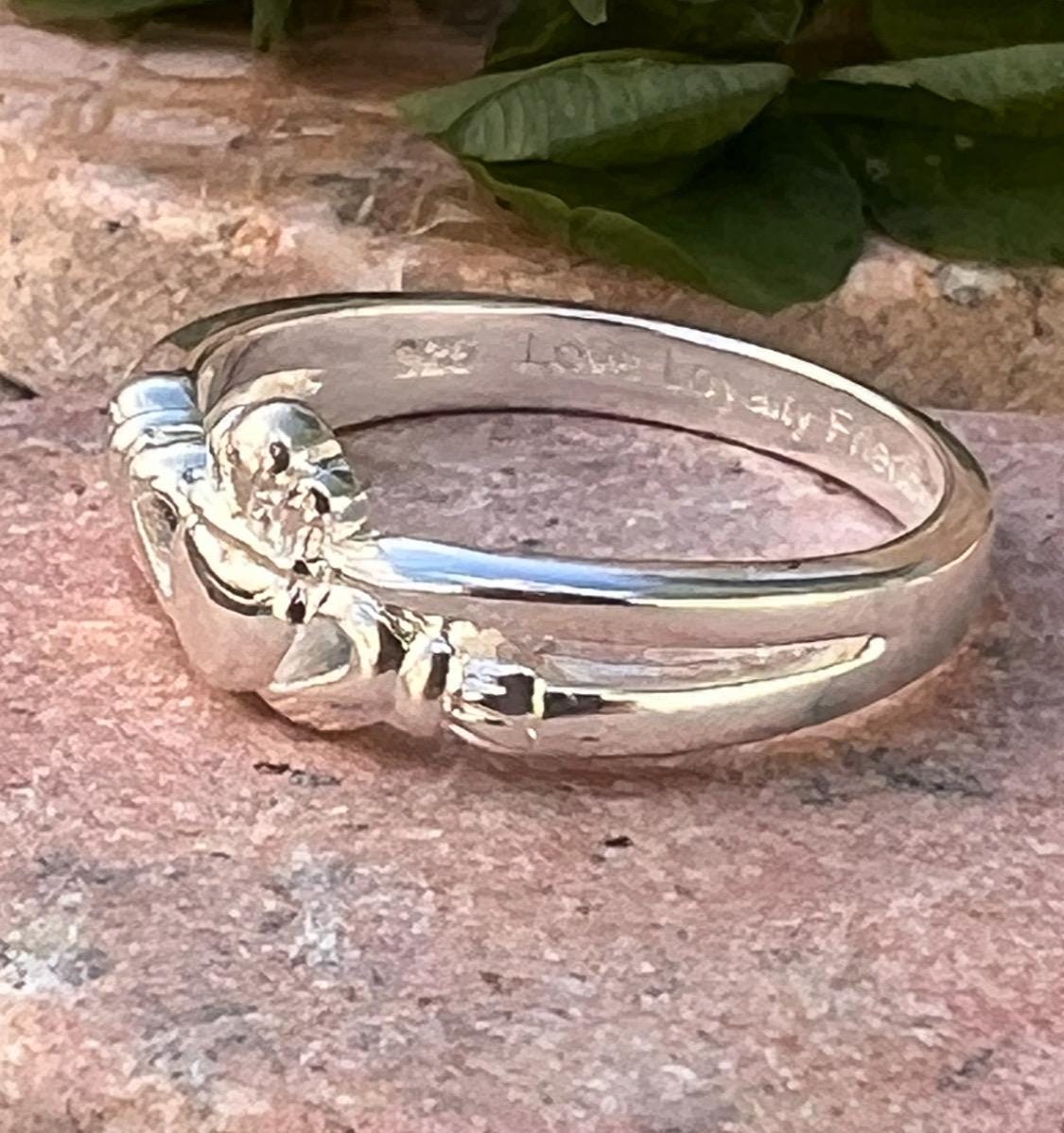 Sterling silver , crossover claddagh ring.