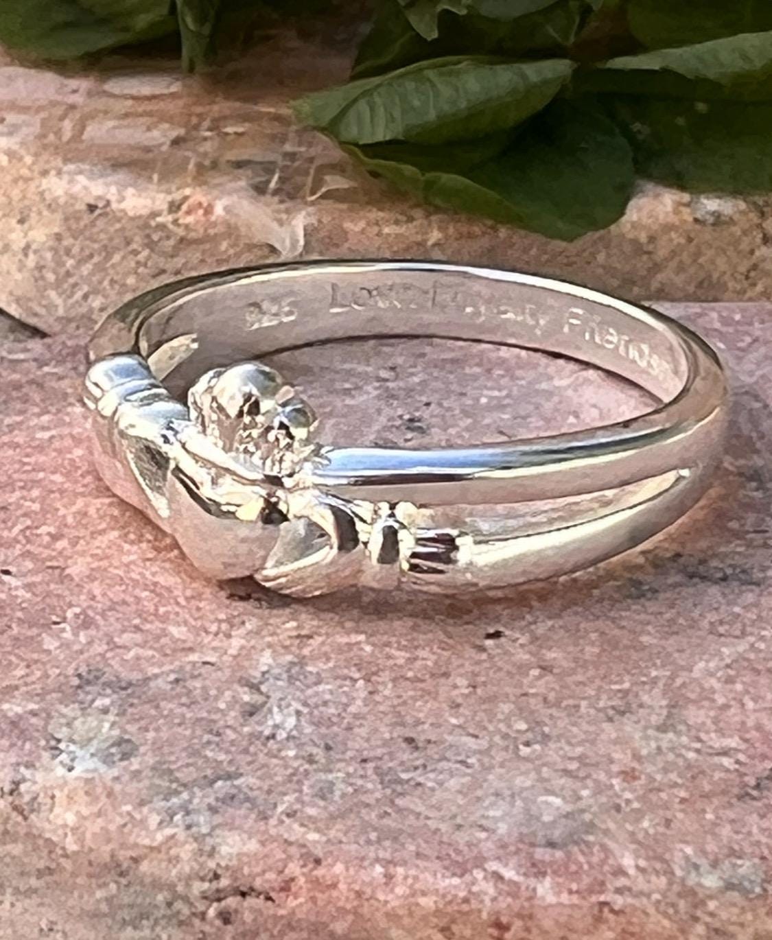 Sterling silver , crossover claddagh ring.