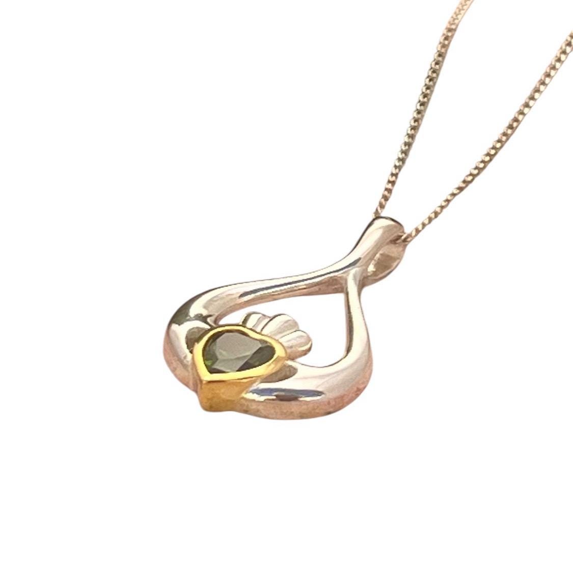 2 Tone silver and 14 ct Gold plating oval shape Claddagh necklace .