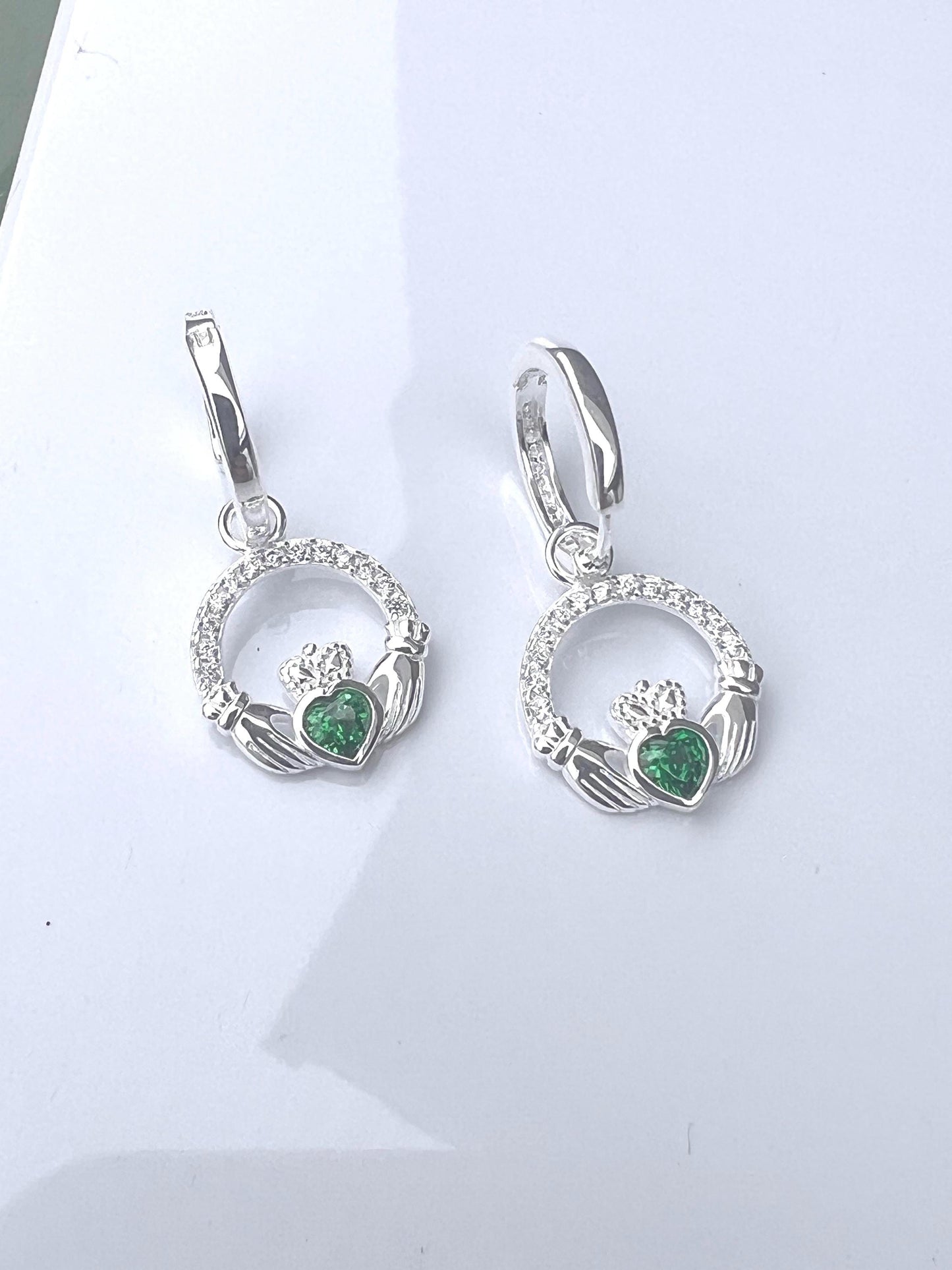 Emerald Green May Birthstone Claddagh earrings on  Huggie hoops ., become part of our z Celtic Community and Celbrate the month of May .