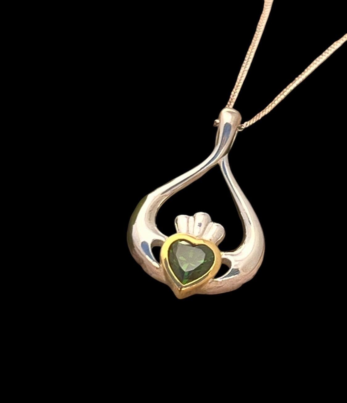 2 Tone silver and 14 ct Gold plating oval shape Claddagh necklace .