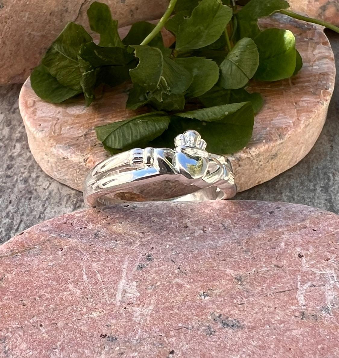 Sterling silver , crossover claddagh ring.