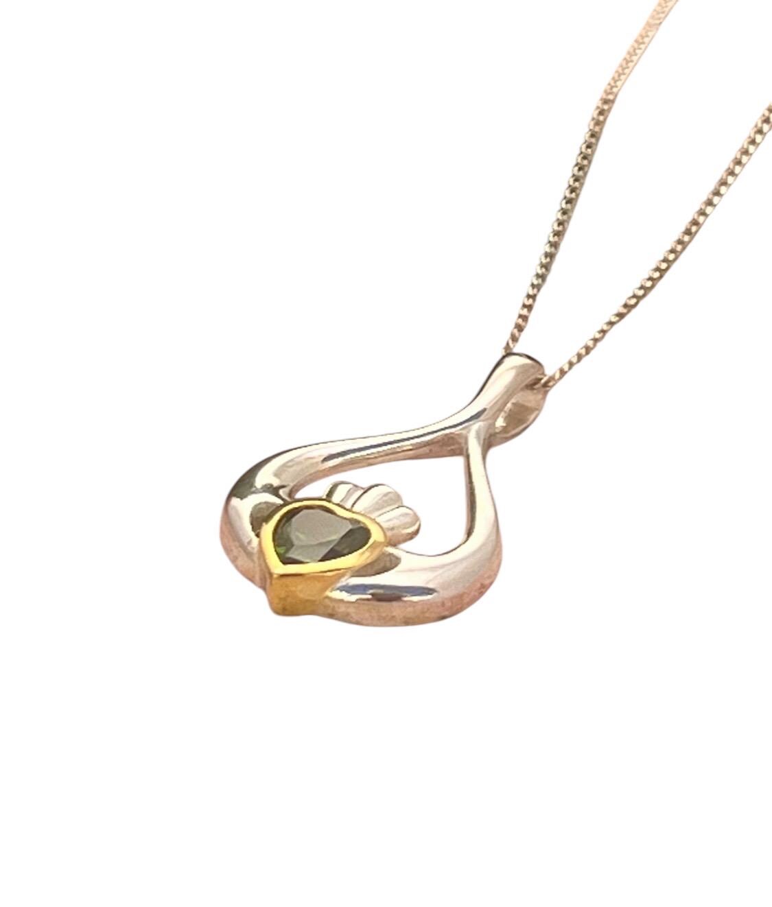 2 Tone silver and 14 ct Gold plating oval shape Claddagh necklace .