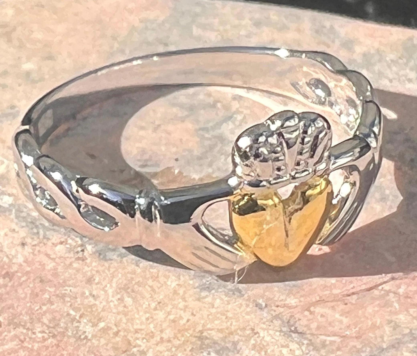 2Tone Claddagh ring with braided band .