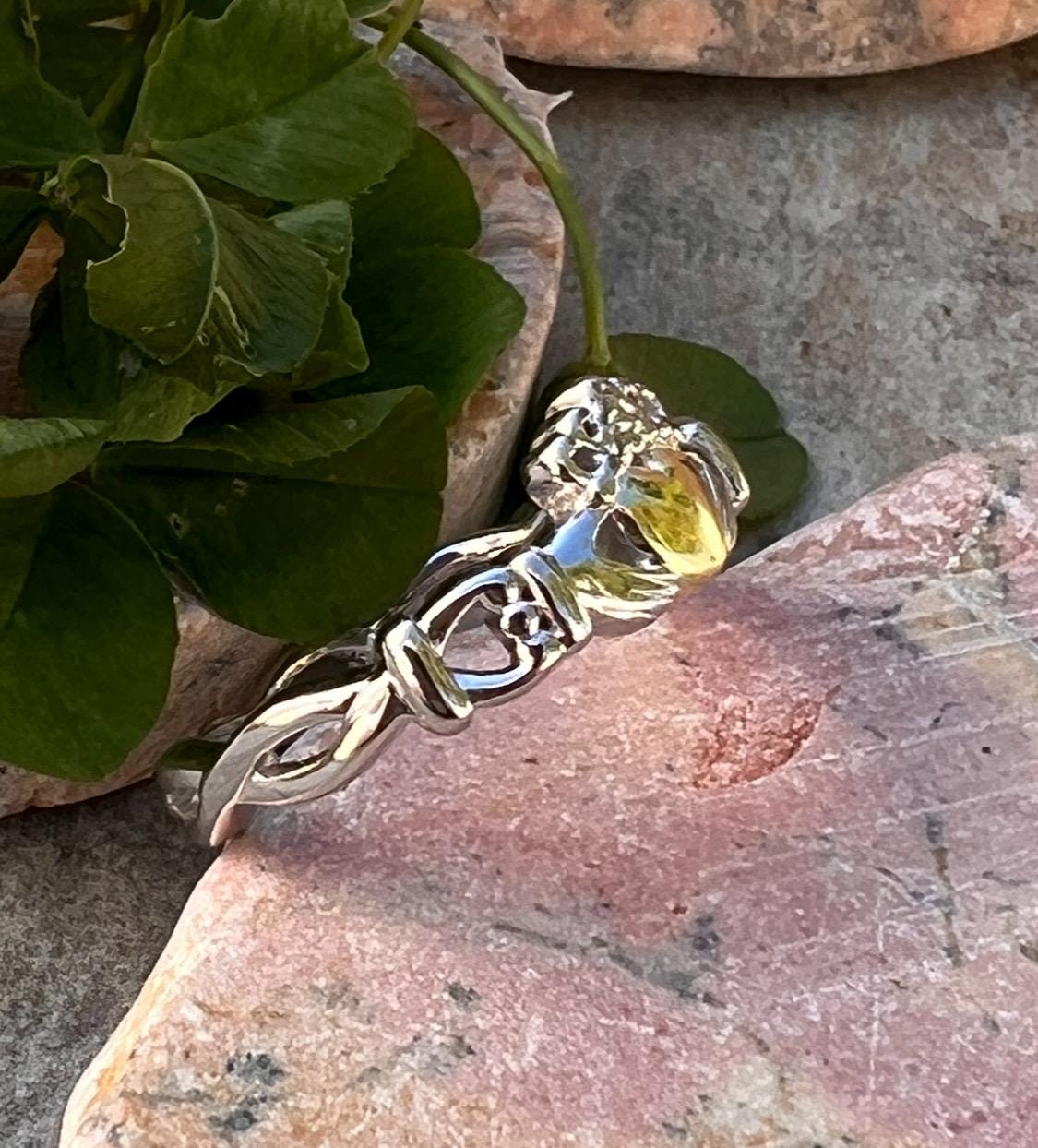 ladies solid claddagh ring with a 14 ct plated heart .