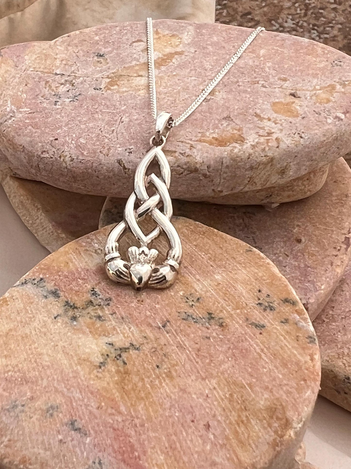 Celtic weave claddagh pendant from Galway .