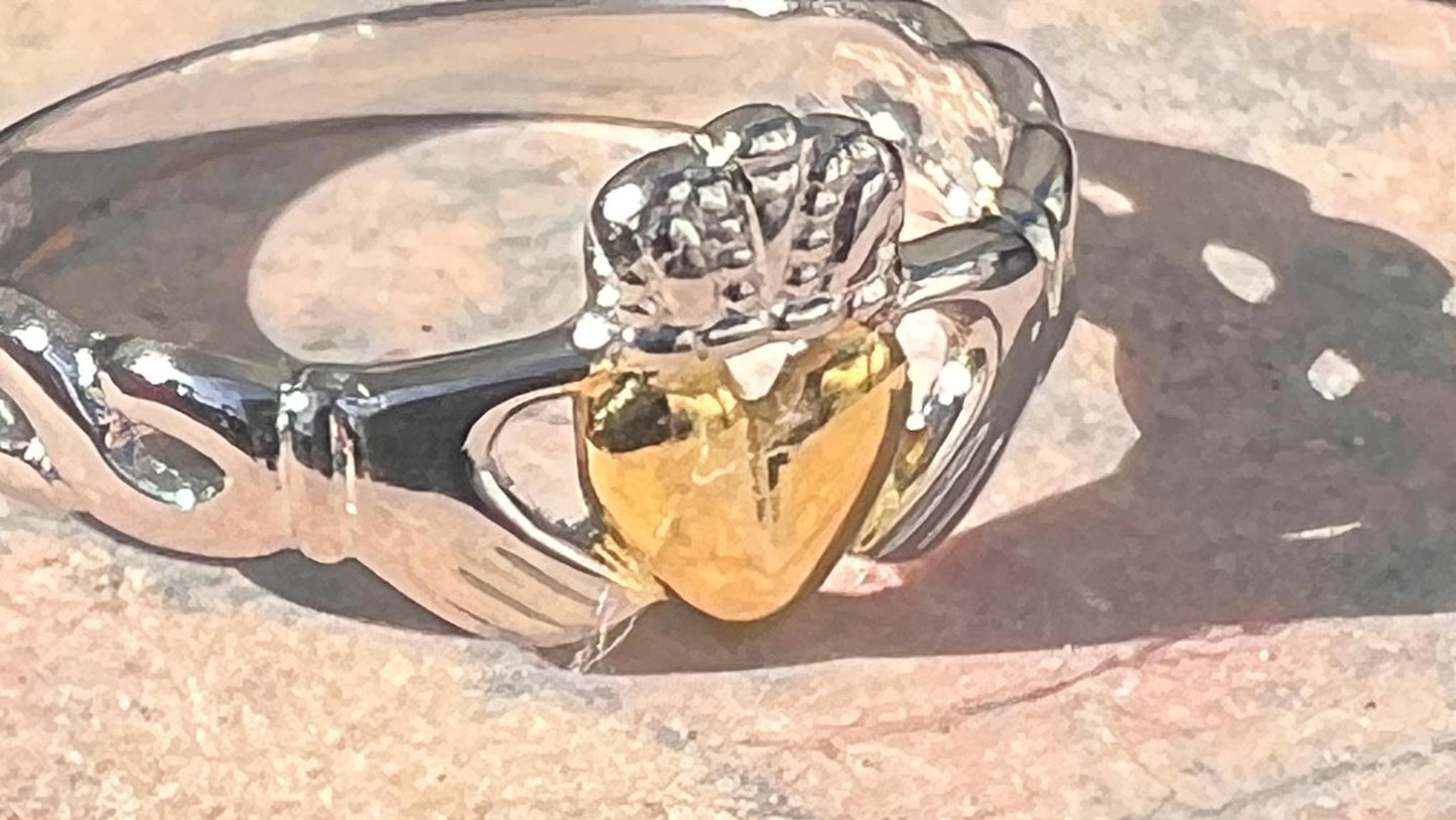 2Tone Claddagh ring with braided band .