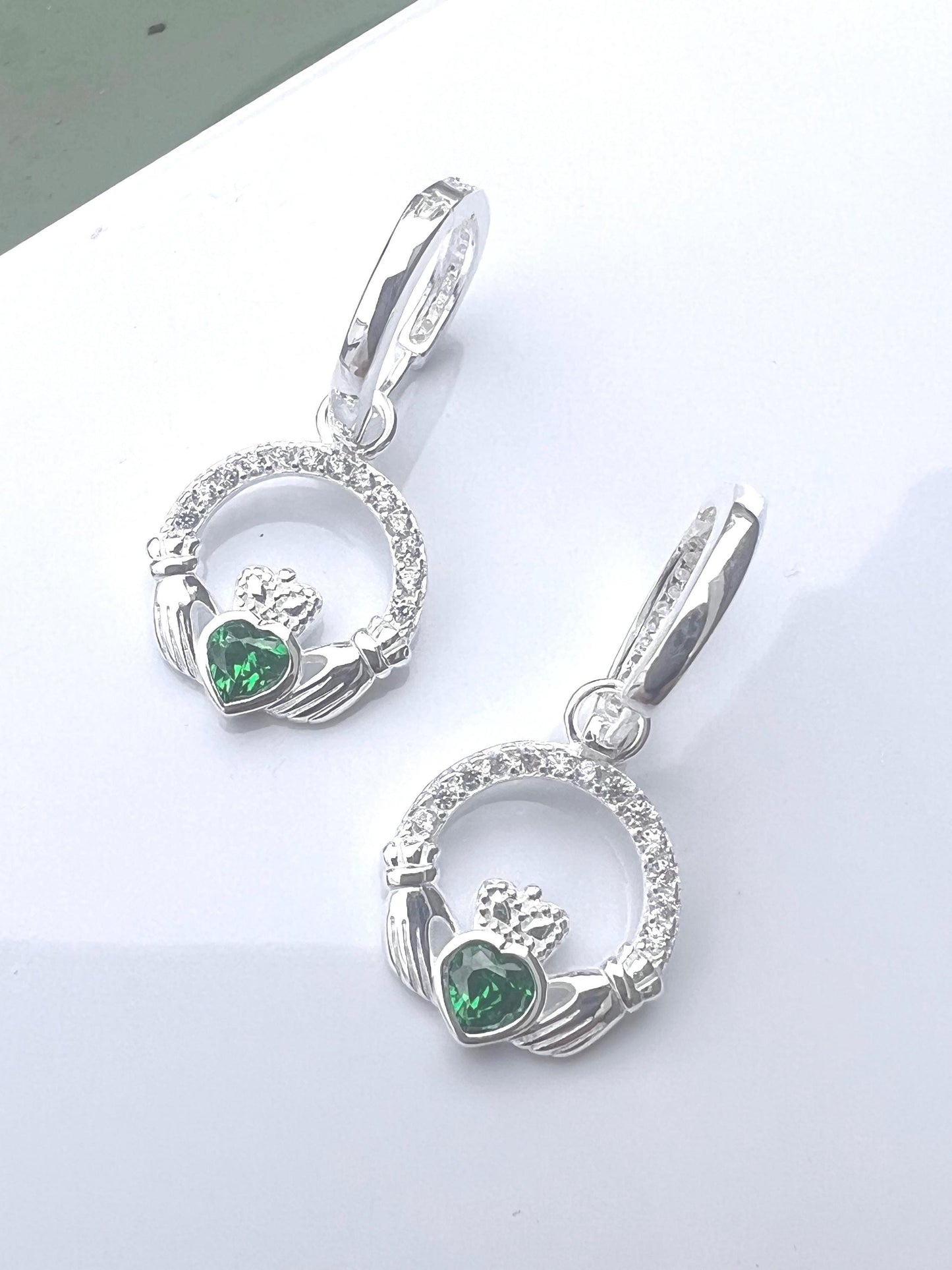 Emerald Green May Birthstone Claddagh earrings on  Huggie hoops ., become part of our z Celtic Community and Celbrate the month of May .