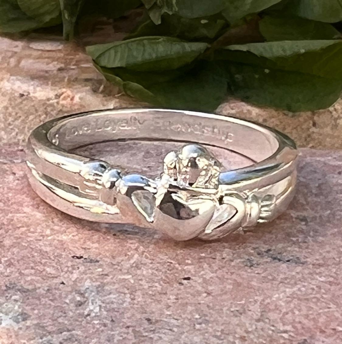 Sterling silver , crossover claddagh ring.