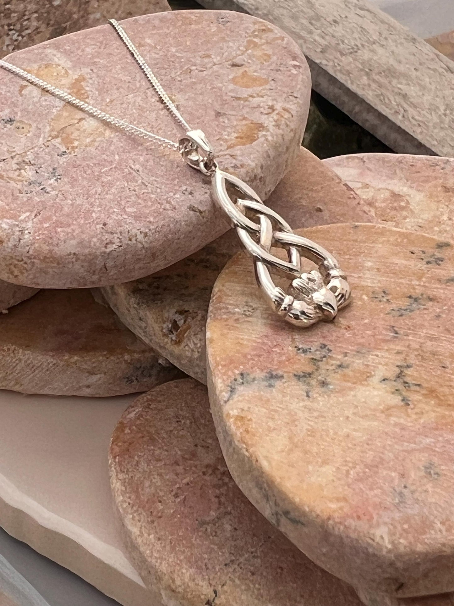 Celtic weave claddagh pendant from Galway .