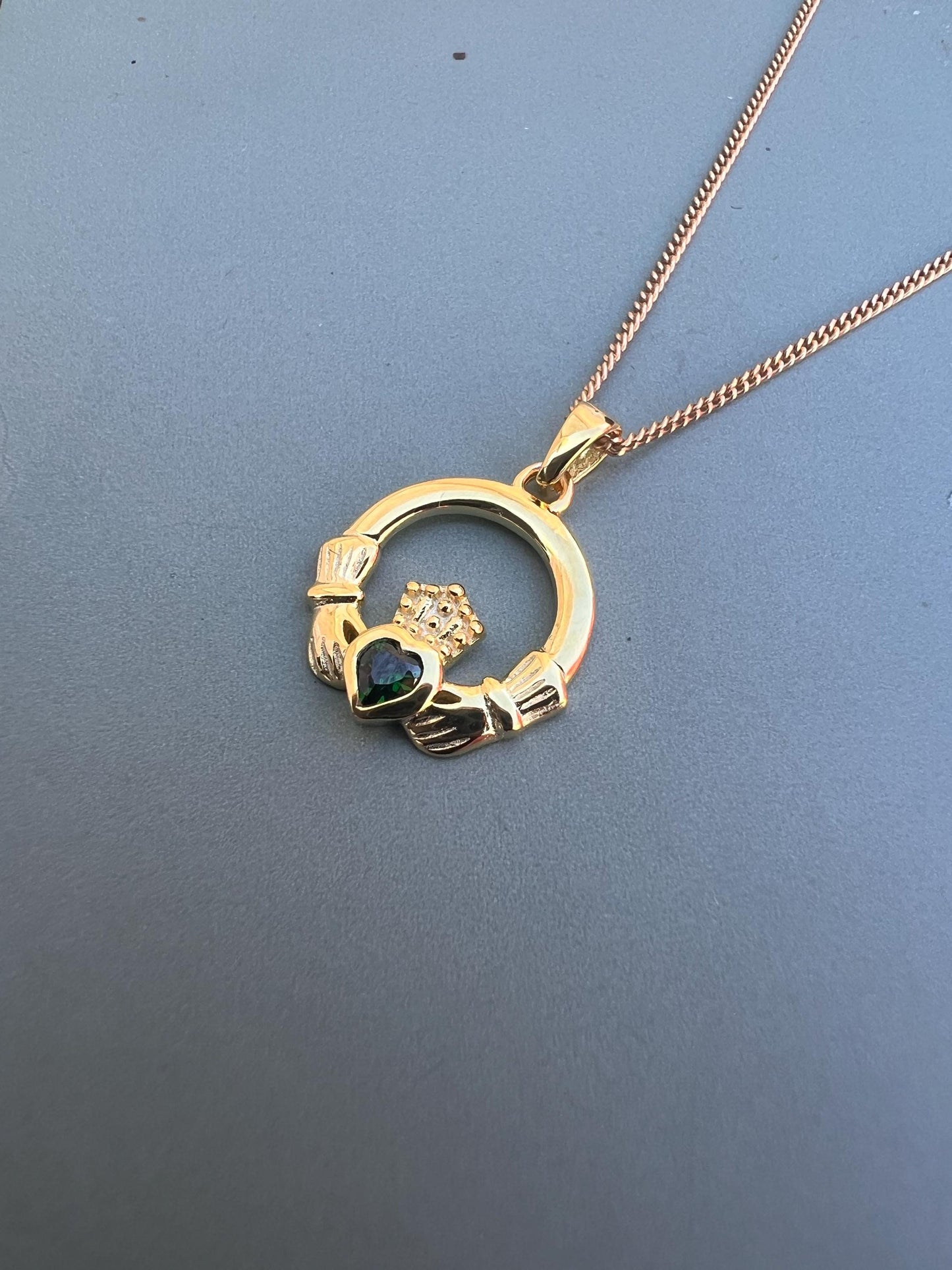 Emerald Green 14 ct gold on Sterling silver Claddagh necklace from Galway .