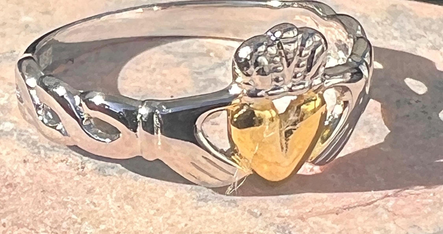 2Tone Claddagh ring with braided band .