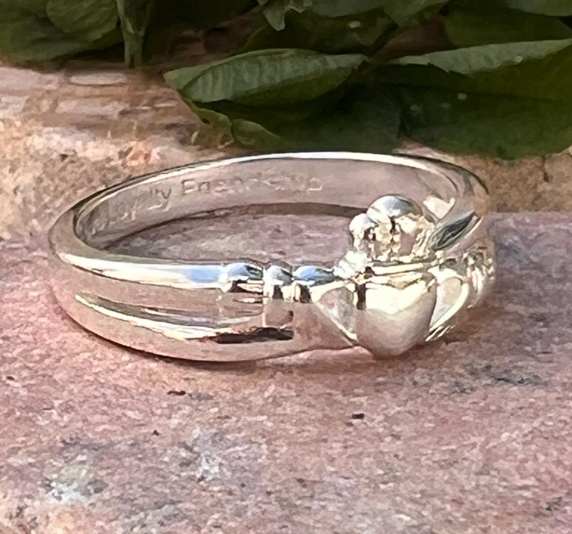 Sterling silver , crossover claddagh ring.