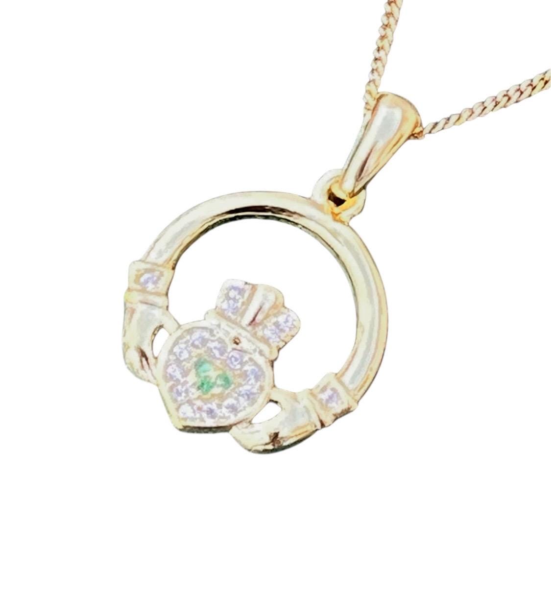 Green and whits stone 14 ct coated on Sterling silver Claggagh pendant on an 18 inch chain .