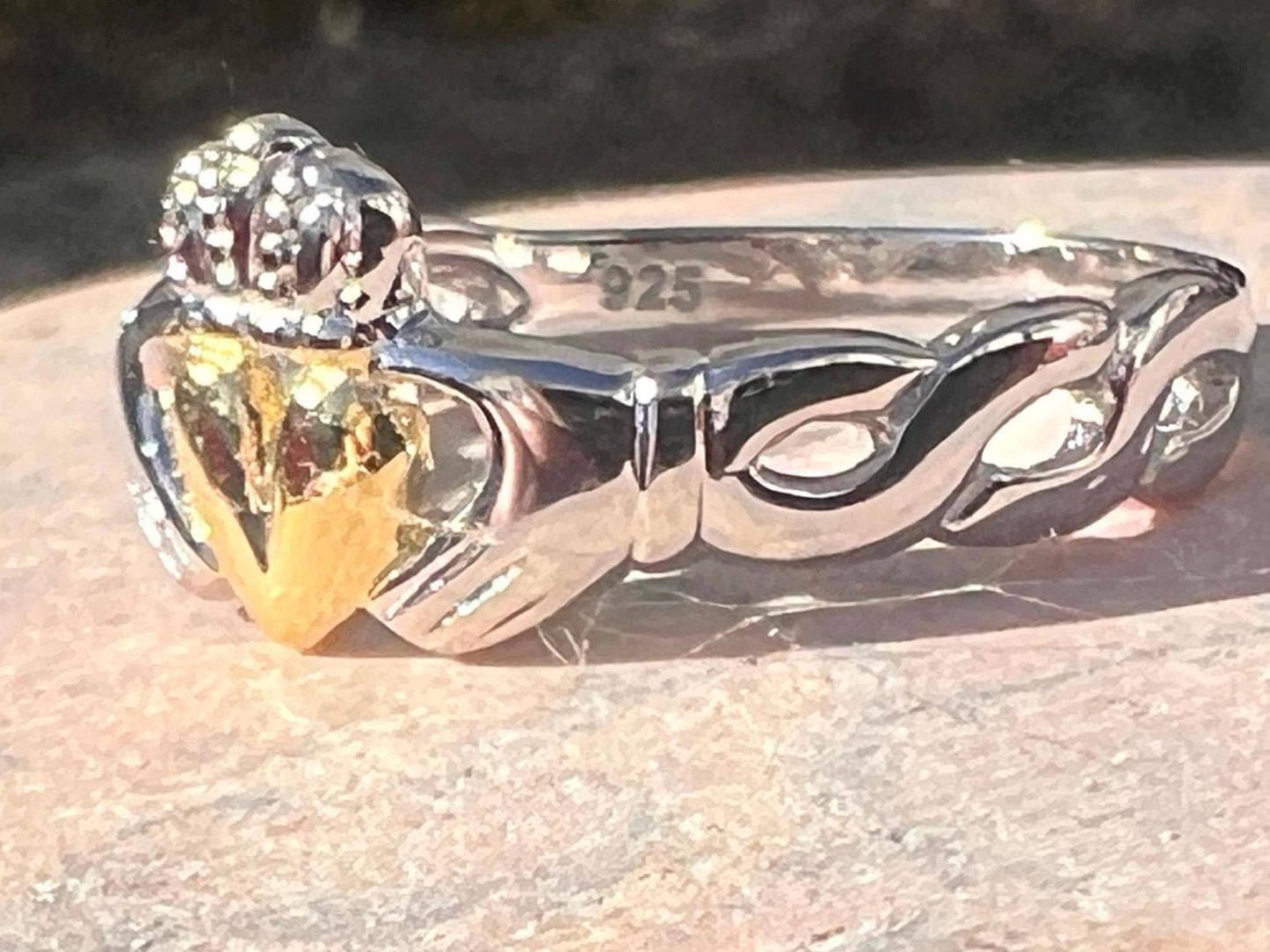 2Tone Claddagh ring with braided band .