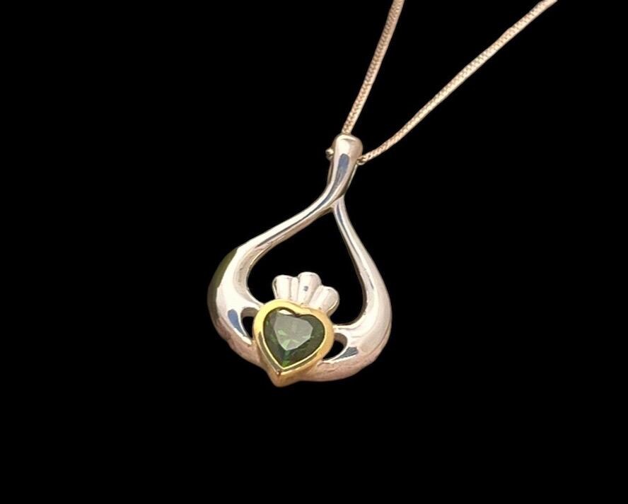 2 Tone silver and 14 ct Gold plating oval shape Claddagh necklace .