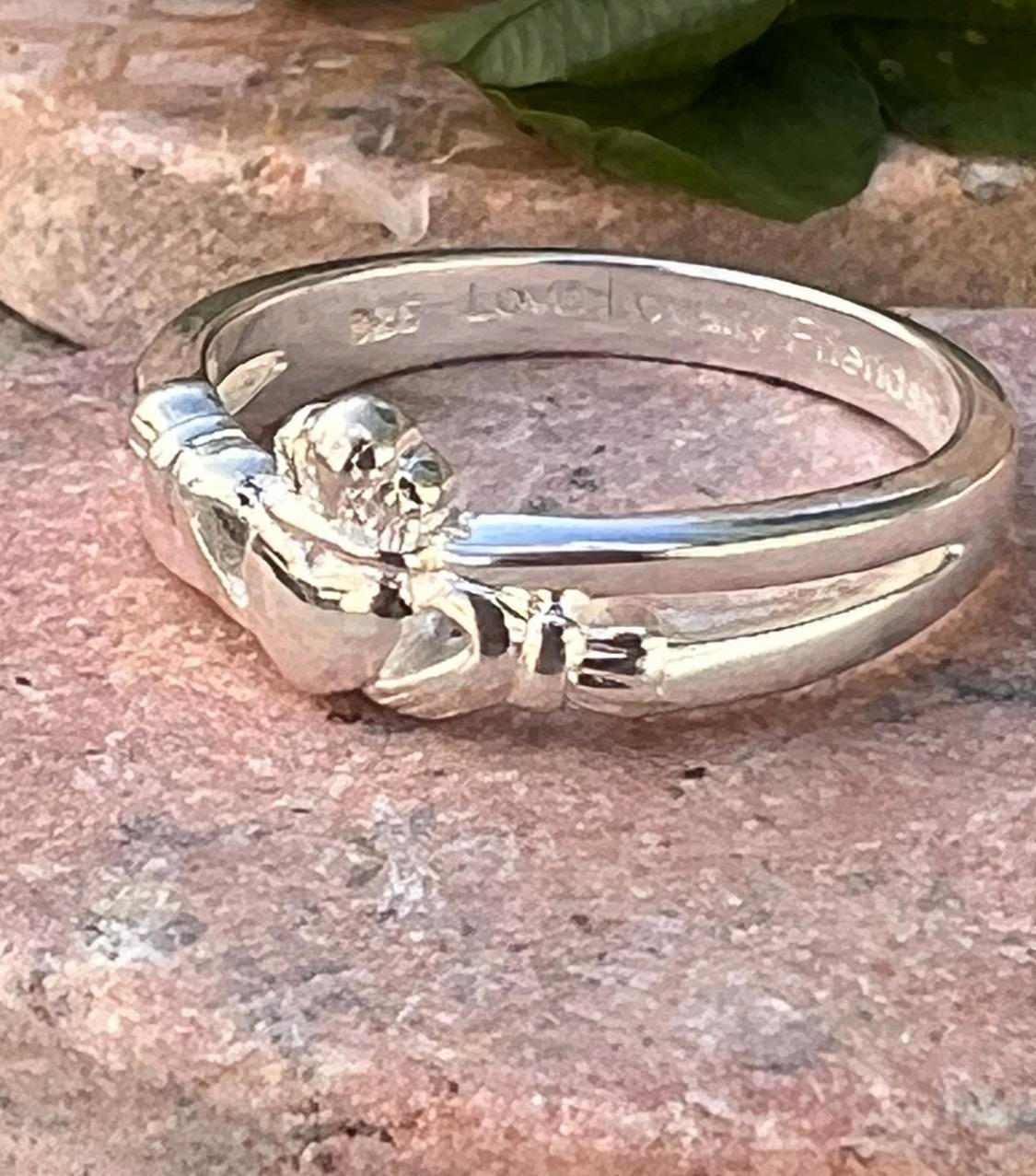 Sterling silver , crossover claddagh ring.