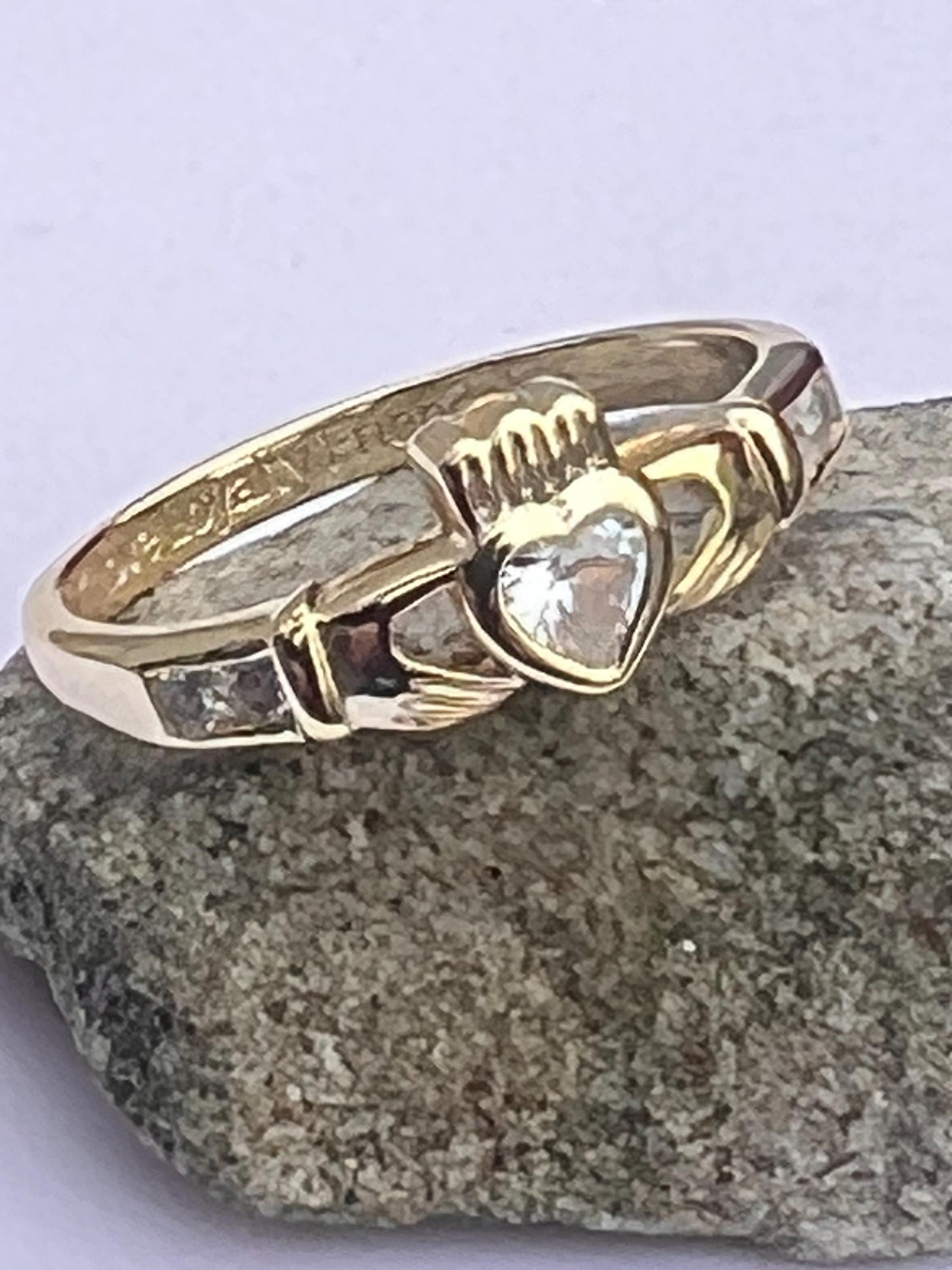 Gold  and diamond , April Birthstone Claddagh ring .