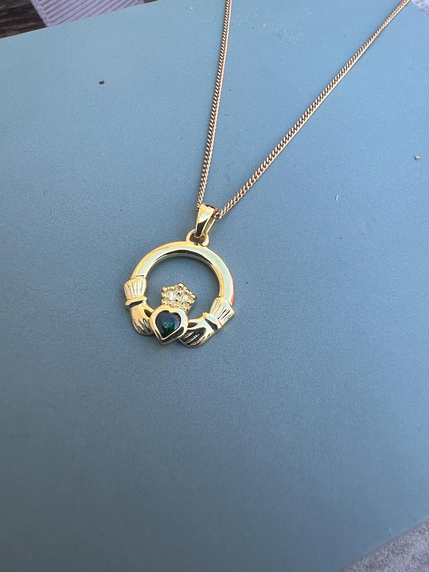 Emerald Green 14 ct gold on Sterling silver Claddagh necklace from Galway .