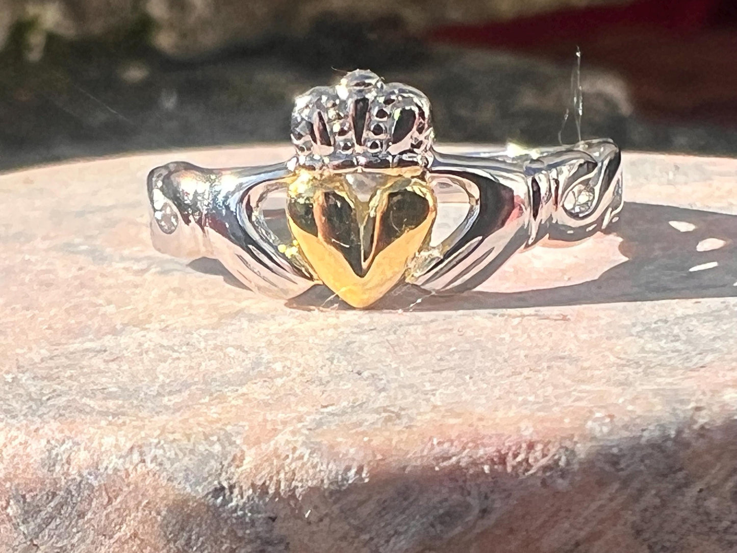 2Tone Claddagh ring with braided band .