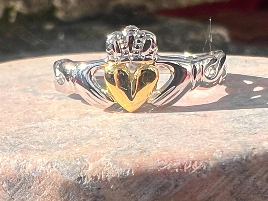 2Tone Claddagh ring with braided band .