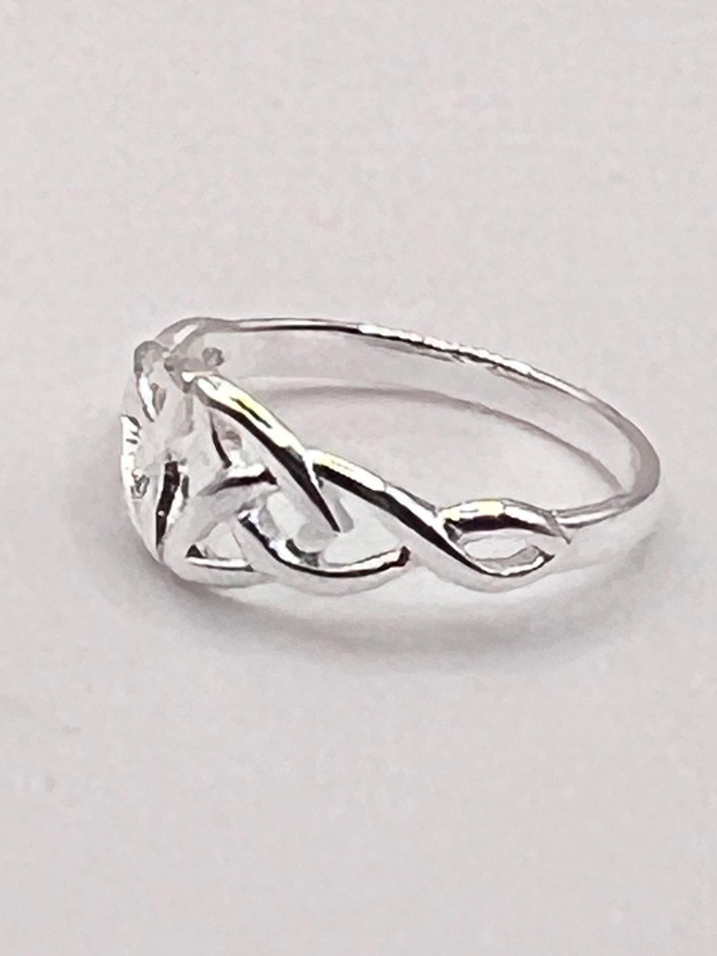 Petite Celtic Trinity Silver  Ring , free registered post worldwide. join our Celtic Community ,from Galway Ireland to you.