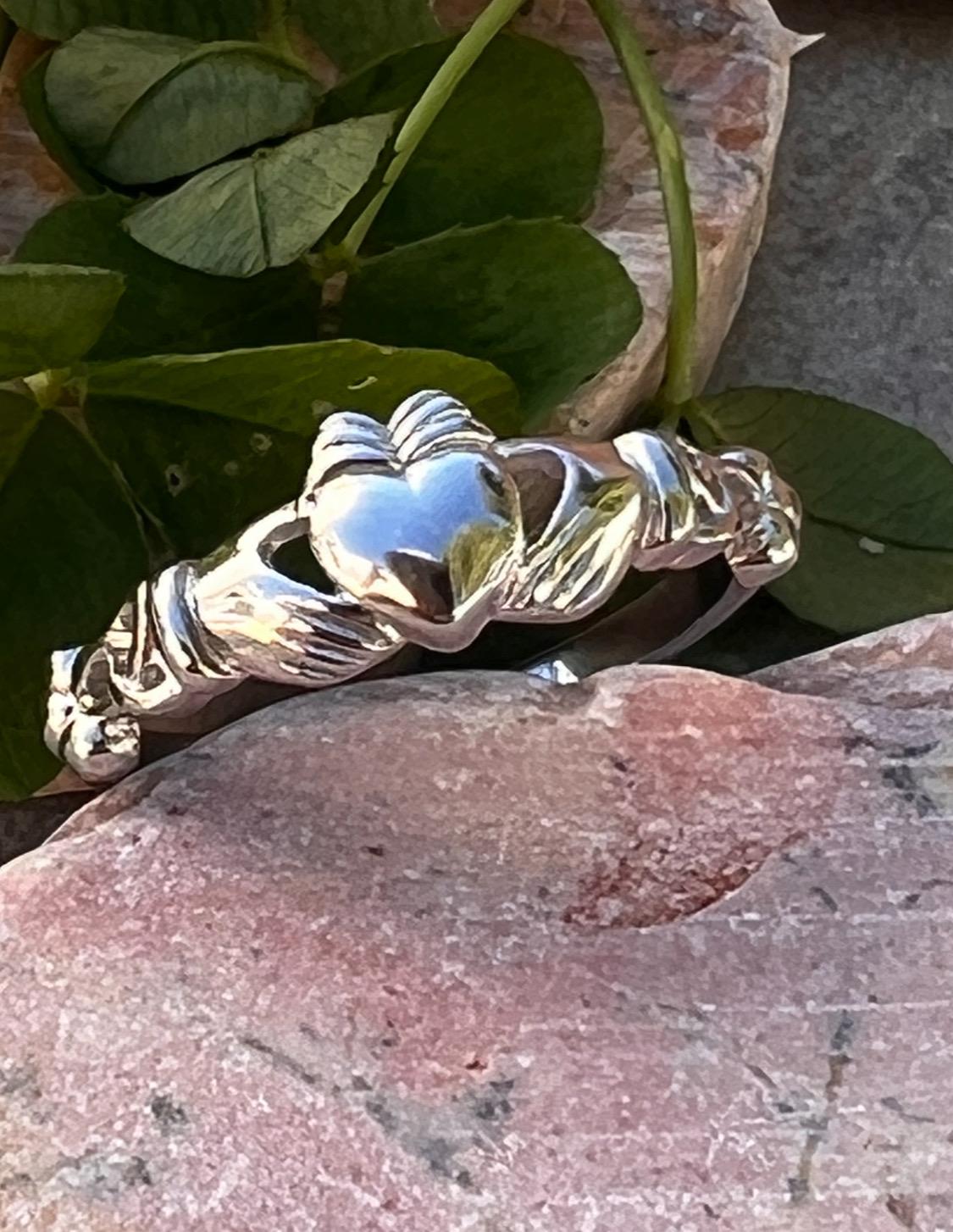 Sterling silver ladies claddagh ring with Celtic trinity’s .