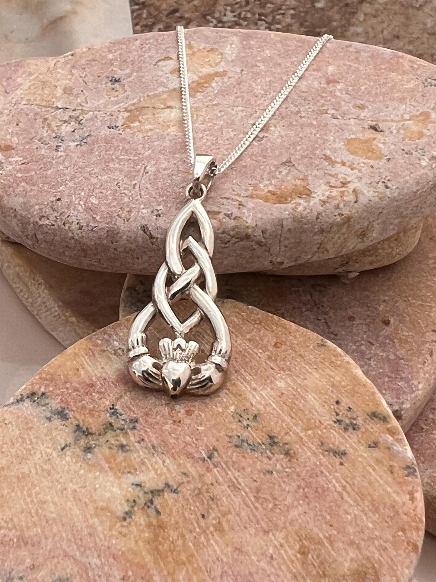 Celtic weave claddagh pendant from Galway .