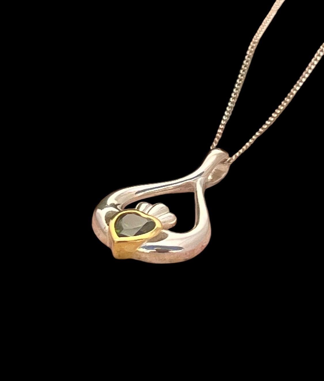2 Tone silver and 14 ct Gold plating oval shape Claddagh necklace .